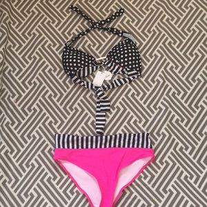 striped and polka dotted two piece bathing suit